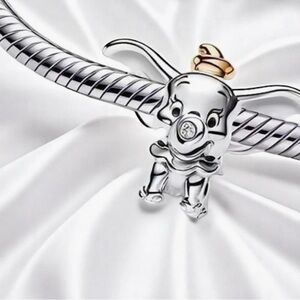 Set of two Authentic Pandora 2 tone elephant charms. 14k and silver. Set of 2.